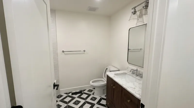 Bathroom vanity alternate view with geometric tile