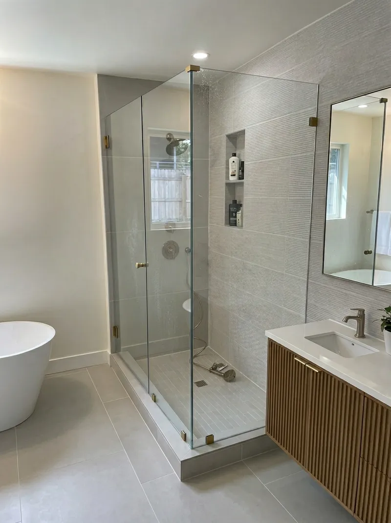 Master bathroom with freestanding tub and glass shower