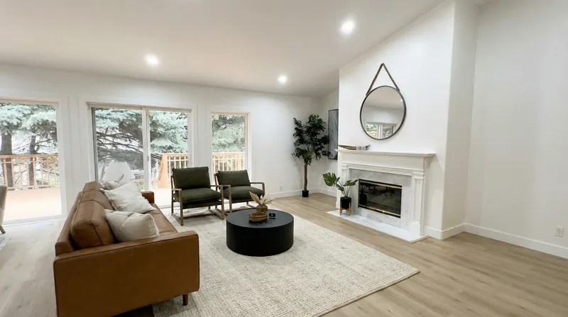 Styled living room with fireplace and modern furniture